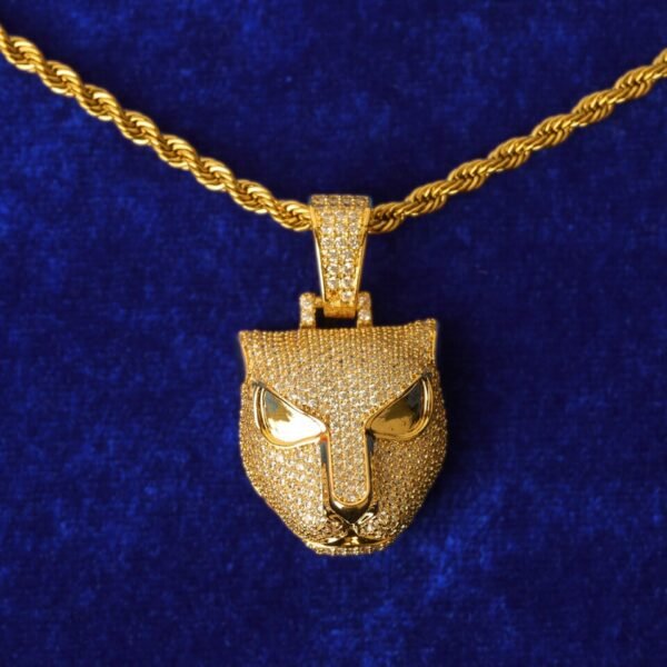 Pendentif tête de léopard doré